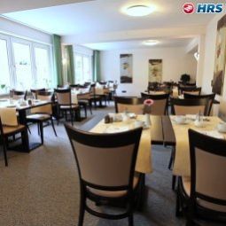 Salle du petit-déjeuner située dans le restaurant Astoria Fotos