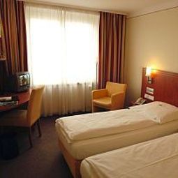 Pokój Concorde Tulip Inn Fotos