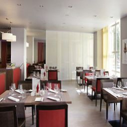 Salle du petit-déjeuner située dans le restaurant Hotel Mercure Wien Westbahnhof Fotos