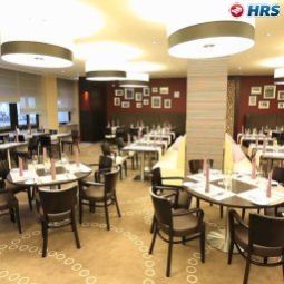 Sala de desayuno en el restaurante Crowne Plaza BERLIN - CITY CTR NURNBERGER Fotos