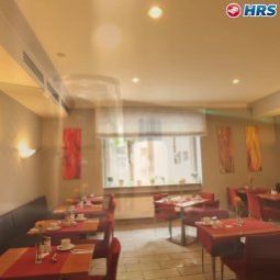Salle du petit-déjeuner située dans le restaurant Astoria Fotos