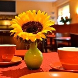 Salle du petit-déjeuner Arosa Garni Fotos