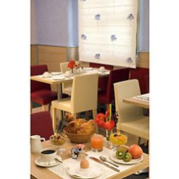 Salle du petit-déjeuner située dans le restaurant Mercure Paris Gobelins Place d'Italie Fotos