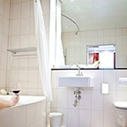Camera da bagno Schweizerhof Fotos