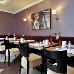 Salle du petit-déjeuner située dans le restaurant Carlton Fotos