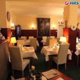 Salle du petit-déjeuner située dans le restaurant Spöttel Fotos