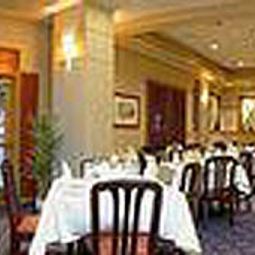 Sala śniadaniowa w restauracji The Plaza Suites Silicon Valley Fotos