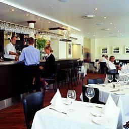 Salle du petit-déjeuner située dans le restaurant Grand Hotel Fotos