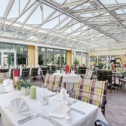 Sala de desayuno en el restaurante Abacus Tierpark-Hotel Fotos