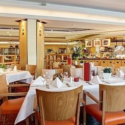 Sala de desayuno en el restaurante Abacus Tierpark-Hotel Fotos