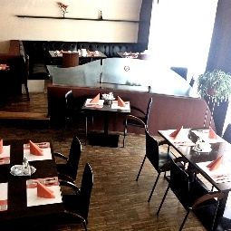 Salle du petit-déjeuner Aria Fotos