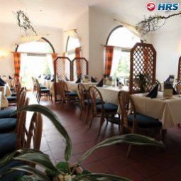 Salle du petit-déjeuner située dans le restaurant Best Western Fotos