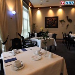 Salle du petit-déjeuner située dans le restaurant Arvena Kongress Fotos