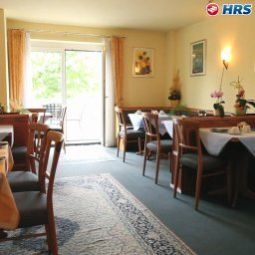 Sala śniadaniowa w restauracji Blutenburg Garni Fotos