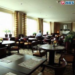 Sala de desayuno en el restaurante Tulip Inn Leiden Centre Fotos
