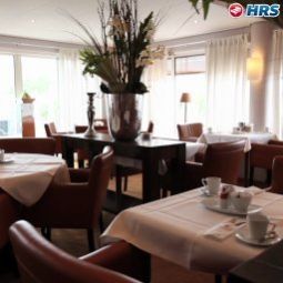 Salle du petit-déjeuner située dans le restaurant Hogerhuys Fotos