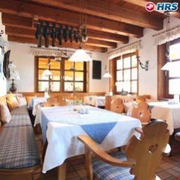 Salle du petit-déjeuner située dans le restaurant Foresta Landhaus Fotos