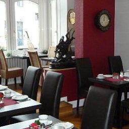 Salle du petit-déjeuner située dans le restaurant Residence City Partner Hotel Fotos