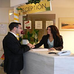 Reception ApartInn Apartmenthotel Fotos