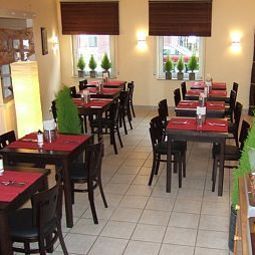 Salle du petit-déjeuner située dans le restaurant Erholung Fotos