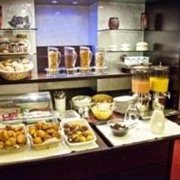 Sala de desayuno Courcelles Etoile Fotos
