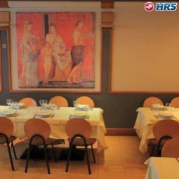 Sala de desayuno en el restaurante Artdeco Fotos