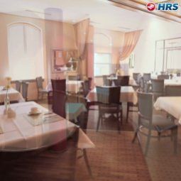 Sala de desayuno en el restaurante SORAT Insel-Hotel Fotos