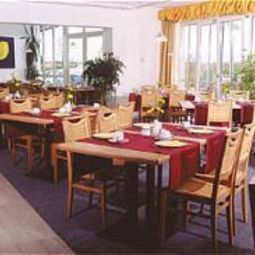Sala colazione nel ristorante Arcus Garni Fotos