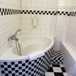Badezimmer Maison am Adenauerplatz Fotos