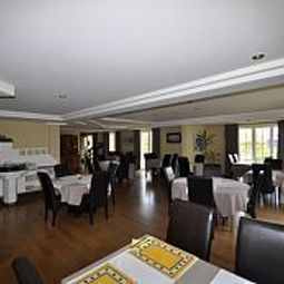 Salle du petit-déjeuner située dans le restaurant St. Janshof Fotos