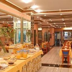 Salle du petit-déjeuner Grand Hotel Puccini Fotos