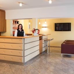 Reception friendly cityhotel Fotos