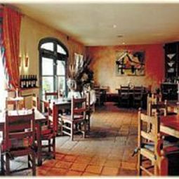 Sala de desayuno en el restaurante Albergo Fotos