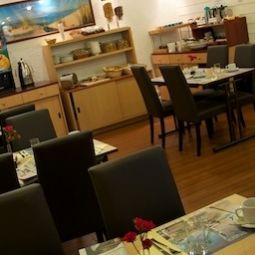 Salle du petit-déjeuner Point France Fotos