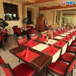 Salle du petit-déjeuner située dans le restaurant Bessunger Forst Fotos