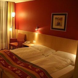 Chambre Ambassador Garni Fotos