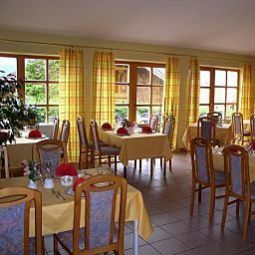 Salle du petit-déjeuner située dans le restaurant Zum Arber Ferienhotel Fotos