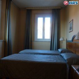 Camera Zanhotel Regina Fotos