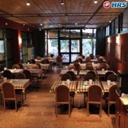 Salle du petit-déjeuner située dans le restaurant Porta Palio Fotos