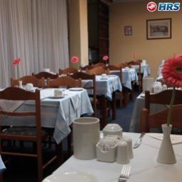 Sala de desayuno en el restaurante Athens Cypria Fotos