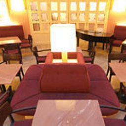 Salle du petit-déjeuner située dans le restaurant Stadt Hotel Citta Fotos