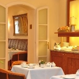 Sala de desayuno en el restaurante Savoy Fotos