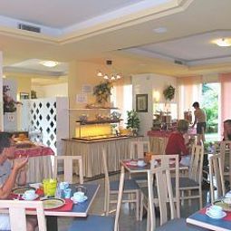 Sala colazione Ambassador Suite Hotel Fotos