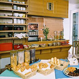 Salle du petit-déjeuner Kyriad Paris Porte d'Orleans Fotos