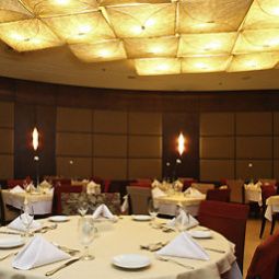 Salle du petit-déjeuner située dans le restaurant Mercure Belo Horizonte Lourdes Hotel Fotos