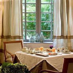 Salle du petit-déjeuner d' Aubusson Fotos