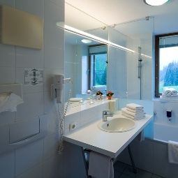 Salle de bains Alpenerlebnishotel Widderstein Fotos
