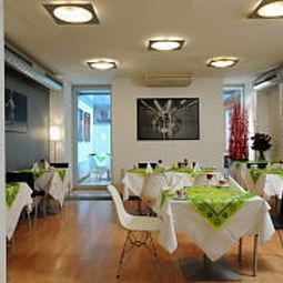 Salle du petit-déjeuner située dans le restaurant Art Hotel Praha Fotos