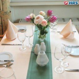 Salle du petit-déjeuner située dans le restaurant Ausspann Fotos