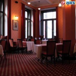 Salle du petit-déjeuner située dans le restaurant Barons Fotos